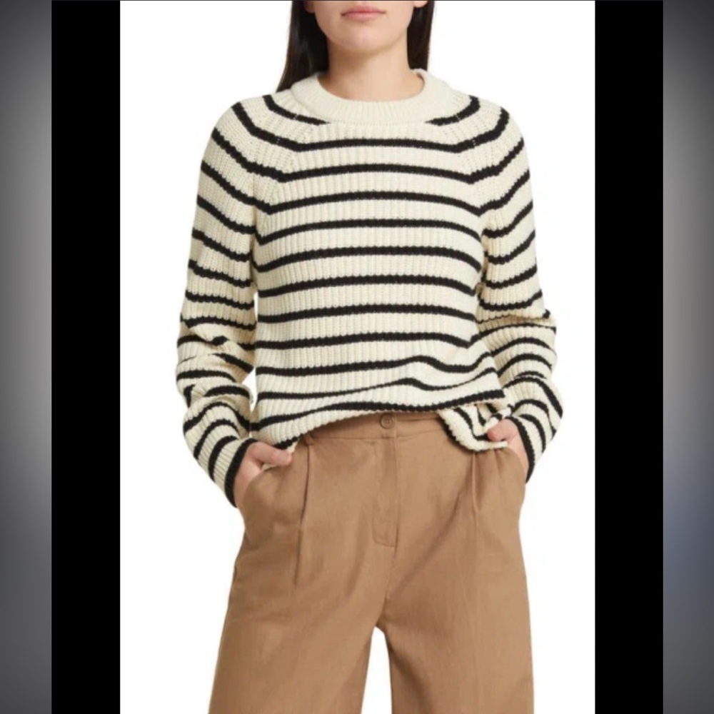 Cozy women’s cream and black stripe sweater